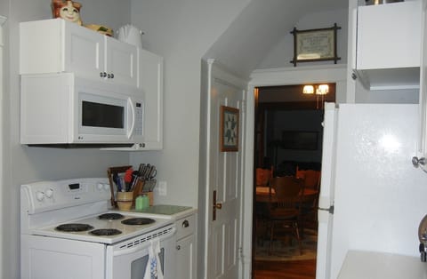 Well supplied kitchen includes full sized appliances, ice maker, dishwasher.