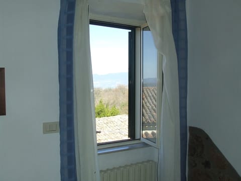 Blue House
Panoramic window in the bedroom 