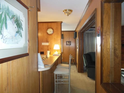 Looking into dining and living areas plus door to large deck