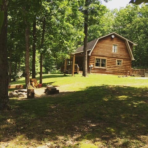 Front yard with fire pit & swing 