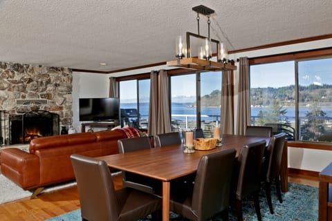 The main upstairs living area connects you with family and the environment