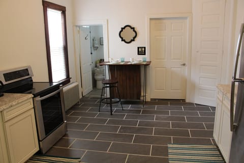 The kitchen with ceramic floor tile