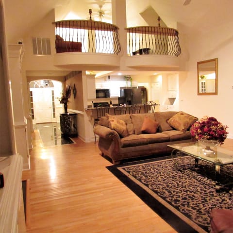 loft that overlooks the living room with magnificent views of the lake