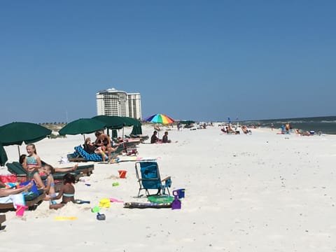 Sugar white sand w/plenty of room for fun in the sun.  2 loungers/umbrella incl.