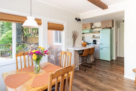 Dining area into breakfast bar and kitchen
