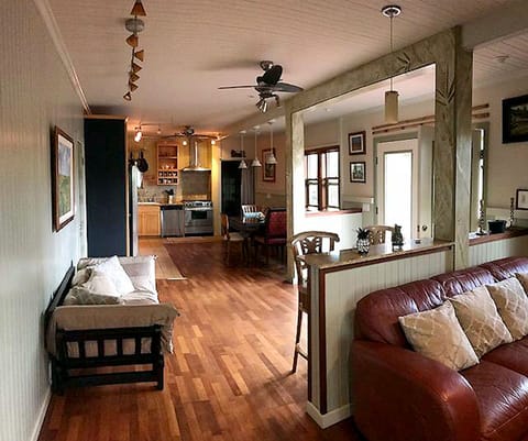 open layout, kitchen, entrance, living area