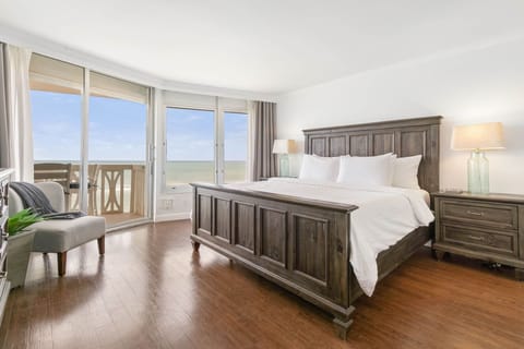 The large master suite has a king-size bed for your comfort. 