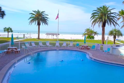 The private beach area is a brief walk from one of the three pools.