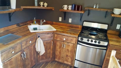 Custom made barnwood cabinets and counters in the kitchen