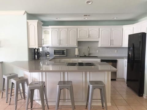 Beautiful gourmet kitchen with counter height seating!