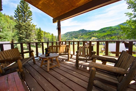 Front porch is perfect for relaxing with friends.