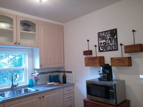 Fully stocked w/ plates, glasses, bowls, napkins, coffee, tea, sugar & cream.