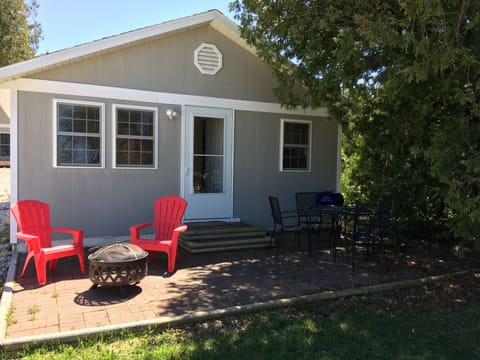 Enjoy either sun or shade on the front porch.