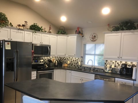 The refurbished kitchen, with under cupboard lighting and new LED spots