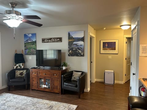 Air purifier in hall leading to bedrooms and bath
