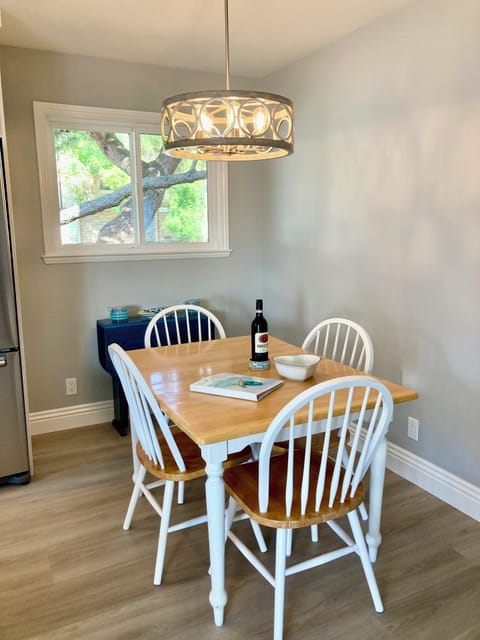 The dining area easily accommodates up to six.