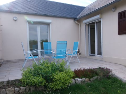 South-facing terrace opening onto the garden
