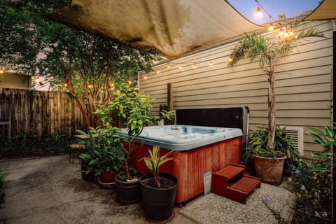 Under the stars, amidst lush tropical greenery, indulge in relaxation. Our 8-person hot tub awaits in the enchanting ambiance of our courtyard garden.