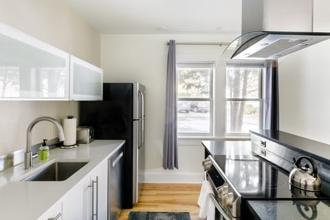 Cook, sip, or snack in a high-end Ikea kitchen—fully equipped for all your culinary needs.