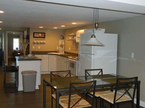 Kitchen with table for seating for 4.