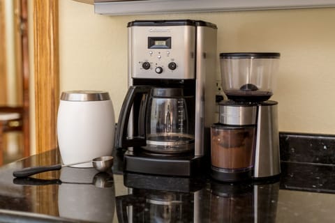 Coffee bar includes Whole bean coffee, Grinder, Cream and Sugar.