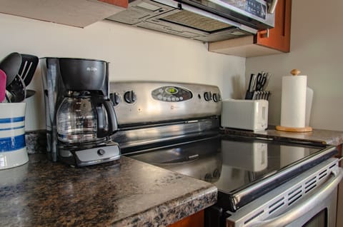 Our fully-stocked kitchen comes with coffeemaker, pots, pans, utensils + dishes.