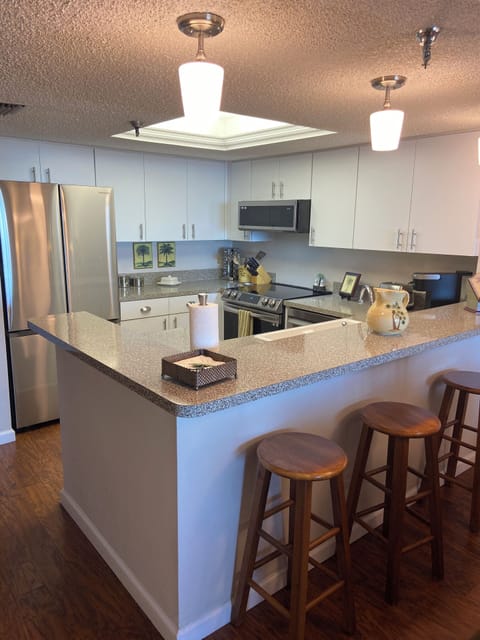 Kitchen - All new stainless steel appliances and counter seating