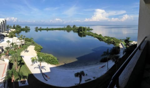 Gulf view from balcony of  white sandy beach & nature trail