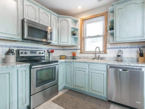 Kitchen with hand painted shabby chic cabinets