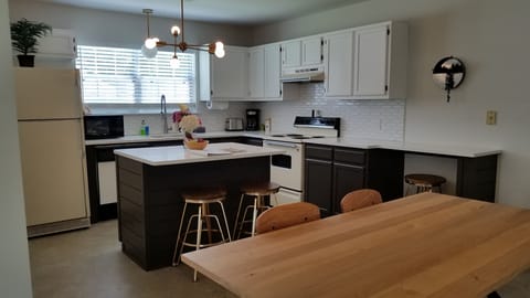 Large Open Concept Eat-In Kitchen with all you need to cook a meal.