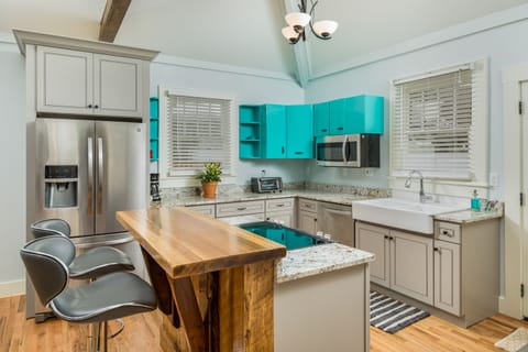 Enjoy a Meal at the Kitchen Bar, Made of Old Growth Pine by the Owner Craftsman