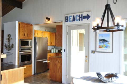 Kitchen and Door to Deck. Dining table for 6