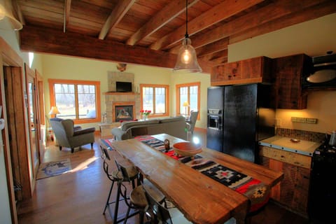 The dining room. kitchen and living room of the Liar's Lodge.
