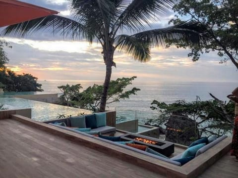 Firepit and seating on lower level for sunset