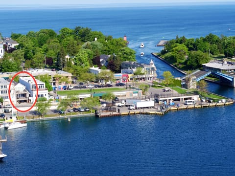 Aerial view  with the Lake View suite building circled in red.
