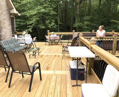New 800 sq ft deck with XL new HOT TUB & tables and chairs for meals , etc,,,
