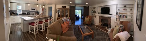 Living room and eat-in kitchen to enjoy the cozy cottage.