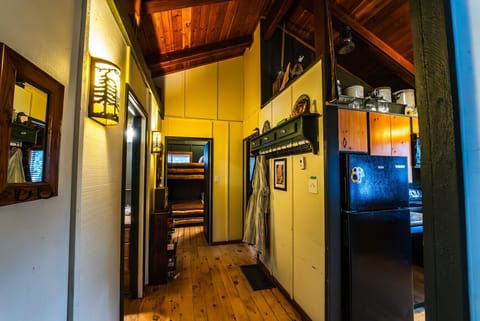 Hallway complete with hooks for cozy robes