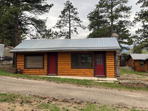Two adorable cabins for the price of one. Second cabin in background on right.