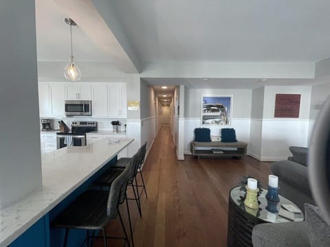 Open concept living and kitchen area Oceanview 302, Isle of Palms, SC | IOP Escapes