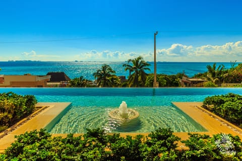Infinity Pool overlooking Cancun Skyline