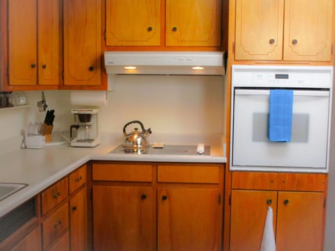 4 burner ceramic stove cooktop  and separate built in oven. 