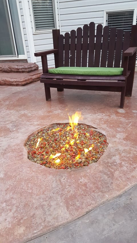 Stained/stamped concrete patio with gas firepit 