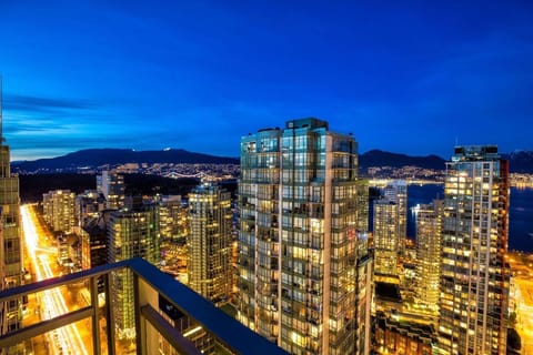 Night time view overlooking Stanley Park and the Lions Gate Bridge to NorthShore