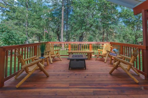 Enjoy relaxing on the log furnishing while enjoying the view.