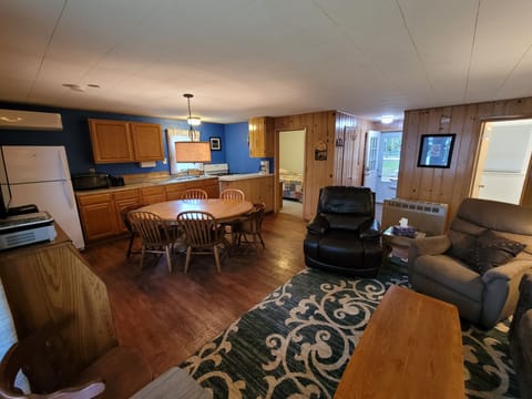 Fully equipped kitchen is integral to the living room space