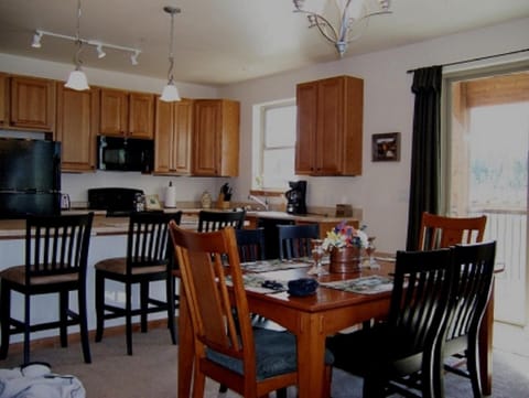 Dining room and fully stocked kitchen