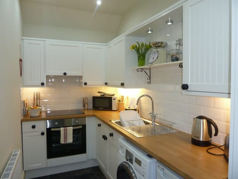 Modern kitchen with welcome pack