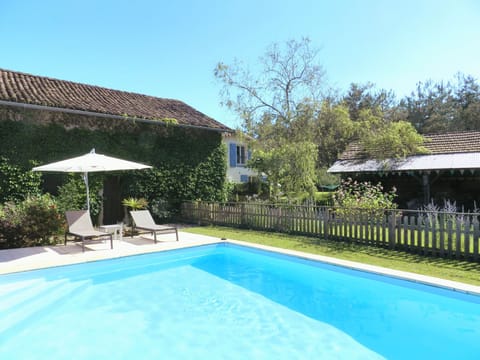Solar-heated Pool in the peaceful rear gardens