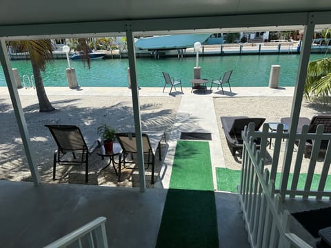 Back patio on canal with quick access to both Atlantic and Gulf via Vaca Cut.